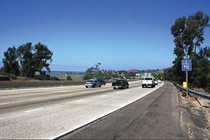 Figure 5.7-12A: Northbound View 2 of Sign 623 at San Elijo Lagoon (Existing View). For more information call (619) 688-6670 or email CT.Public.Information.D11@dot.ca.gov