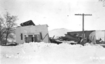 A black and white picture of a building wrecked by a snowstorm in 1912 Big Pine.