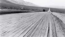 A black and white picture of the road that would become State Route 14 between Mojave and Bishop in 1927.
