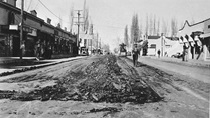 A black and white picture of Main Street in Bishop in 1934 after a road repair.