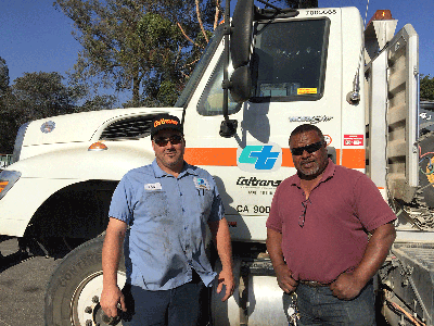 A motorist stranded in a dead cell phone area near Gaviota thanked Caltrans Maintenance Supervisor Alfred Lang and Mechanic Troy Jackson for helping him move and repair his classic vehicle.