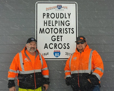 Left to right: Caltrans Equipment Operator II’s William (Bill) Silva and Miguel (Gus) Medina rescued a grateful couple who had been stuck in the snow all day on Troy and Donner Pass Road.
