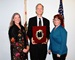 Left to right: Caltrans District 7 Public Information Officer Lauren Wonder, Los Angeles Times Reporter Thomas Curwen and Caltrans District 7 Director Carrie Bowen stand as Curwen is honored for advancing roadway safety.