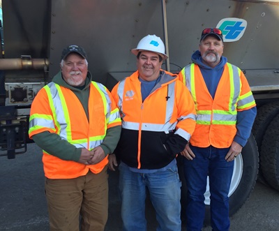From left to right, Caltrans Equipment Operator II Kenneth Myers, Maintenance Supervisor Rodney Walker and Equipment Operator II James Anderson each earned the State Employee Medal of Valor Award for rescuing a woman trapped upside down in a car in fast-flowing creek on Jan. 29, 2016.