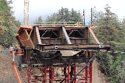 Caltrans used tension cables to pull the pieces of the bridge across the rugged Pfeiffer Canyon.