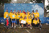 Caltrans Cares Team from left to right front to back: Angela Shepard, Mariano Pontillas, Zilan Chen, Pete Spaulding, and Vivian Nguyen are kneeling. Matthew Friedman, Ann Mahaney, Blair Thompson, Cindy Pribyl, Katelynn Krycia, Jeaneete Mactzul and Al Kwan are standing in the middle row and Lee Beebe, Peter Meshot, Isabel Meshot, Brian Maguire, Monique Maguire, Alex Kenefick and Ted Evans are in the back row.