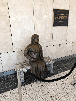 The Rosa Parks statue looks upon its new home at the Caltrans District 8 office, now known as the Rosa Parks Memorial Building.