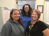 District 2 Dispatchers Erin Titus, Karen Law, and Lane Closure System Coordinator Kristen Begrin created a makeshift communication system during the Redding office evacuation during the Carr fire.