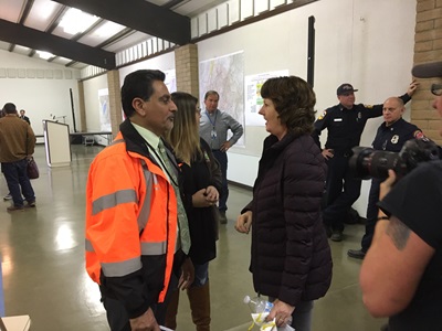 Caltrans regional District 3 Director Amarjeet S. Benipal talks with Paradise Mayor Jody Jones, who was District 3’s director for 13 years, in November 2018 before a Camp Fire briefing with then-Gov. Edmund G. Brown Jr.