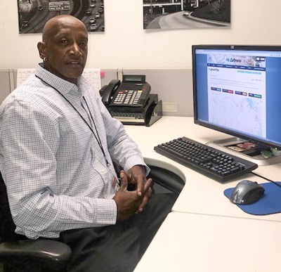 District 7’s Toney Griffin, an equipment operator II, serves the public from his 13th-floor work station in downtown Los Angeles