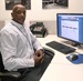 District 7’s Toney Griffin, an equipment operator II, serves the public from his 13th-floor work station in downtown Los Angeles