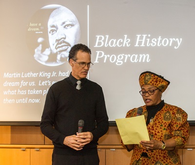 Michael Parks and Rena Francis lead the Negro National Anthem to help kick off a 90-minute program at the Black History Celebration.