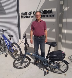 District 5 Engineer Commutes With a Fold-up Bicycle