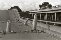 Near Watsonville, Highway 1 partially collapsed over The Struve Slough, with posts punching through the roadway’s surface.