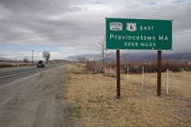 A few hundred yards after it forks off from U.S. Highway 395, State Route 6 challenges you to go the distance with this sign.