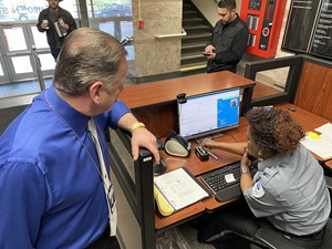 The BadgePass system saves time for Caltrans entry-desk security guards by allowing them to run visitors' driver's licenses through a card-scanner.