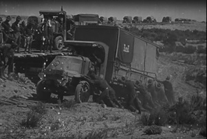On July 7, 1919, a young Dwight D. Eisenhower and 300 other men set forth in 81 Army vehicles and trailers to motor from Washington, D.C., to San Francisco. This image is a screen grab from a National Archives film about the trip.
