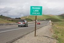 Having turned off State Route 33 onto westbound State Route 140, motorists head past the San Luis Reservoir toward Gilroy.
