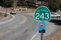 The state highway, shown here near the southern entrance to the mountain town of Idyllwild, is a National Scenic Byway.