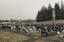 Journalists from throughout the world covered California's wildfires this year. Above, reporters attend a press briefing in District 4. (Photo by John Huseby)