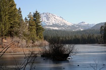 Looming past Manzanita Lake is Mount Lassen, which you can climb during the summertime, provided you time it right and have the hiking chops.
