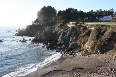 The sun continues to its descent on the horizon as Highway 1 wraps around another secluded Northern California beach.