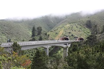 A few miles south of Pacific, Highway 1 passes through the Tom Lantos Tunnels.