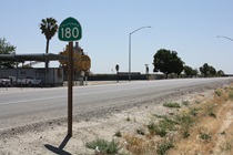 From its western starting point in Mendota, Highway 180 sets out on a level and straight path to Fresno, an hour away.