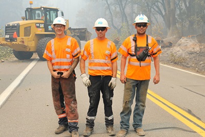 Quentin Ramirez, Erik Groennings, and Robert Logan with the District 2 Tree Crew working on the Dixie Fire. Photo taken by PIO Haleigh Pike. 