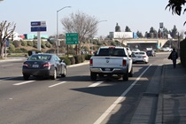 State Route 140 goes through the bulk of the Merced, passing by State Route 99 not too far from downtown.