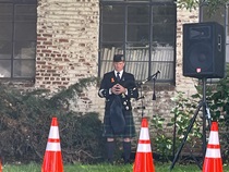 At the District 5 ceremony, Paul Dunn was a bagpiper,