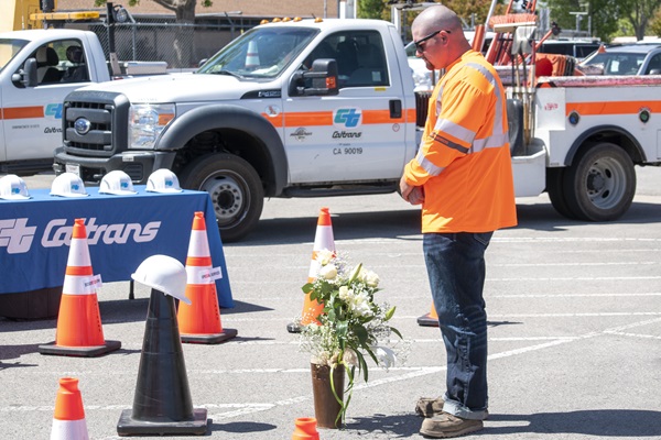 Inyokern maintenance worker Peyton Smith bows his head in silence as part of the District 9 Workers Memorial on May 4 in Bishop  (Photo by Michael Lingberg)