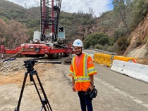 In District 10, television specialist Anup Giri is at the site of a slope stabilization project along State Route 140 in Mariposa County. (Photo by Bob Highfill)
