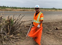 In District 3, Willows maintenance worker Odilon Hernandez collects litter on the median of Interstate 5 in Glenn County.