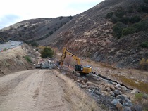 In District 5, the rock slope is restored after a tanker truck overturned on southbound State Route 166 and spilled oil into the Cuyama River. (Photo by Romano Verlengia)