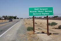 Memorial signs are a common feature of the state highway system. So is the nearby, parallel presence of rail lines.