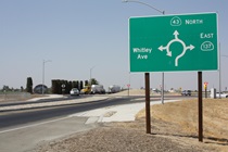 Highway 43's intersection with State Route 137 features another fairly new roundabout. SR-137 heads northeast toward Tulare.