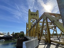 State Route 275, aka Tower Bridge, spans the Sacramento River a mile or so west of the Capitol.