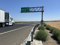 Southbound motorists on Interstate 580 come upon the State Route 132 exit a few miles south of Tracy..