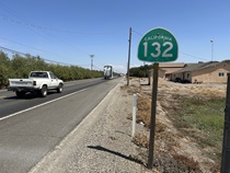 Trucks of various sizes tend to dominate portions of SR 132, which is lined with agricultural endeavors.