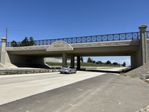 Modesto proudly posts its mantra "WATER WEALTH CONTENTMENT HEALTH" above various roads, including SR 132.