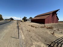 Agricultural scenes and free flow return to dominance after State Route 132 has exposed motorists to innumerable stoplights in Modesto.