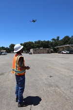 Kevin Andersen flies a drone in District 2