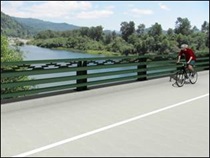 Rendering of the proposed design for the Dr. Fine Bridge replacement, showing the widened bike lane. 