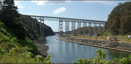 Aerial photo of Albion River Bridge looking out toward the coastline and the Pacific Ocean. 