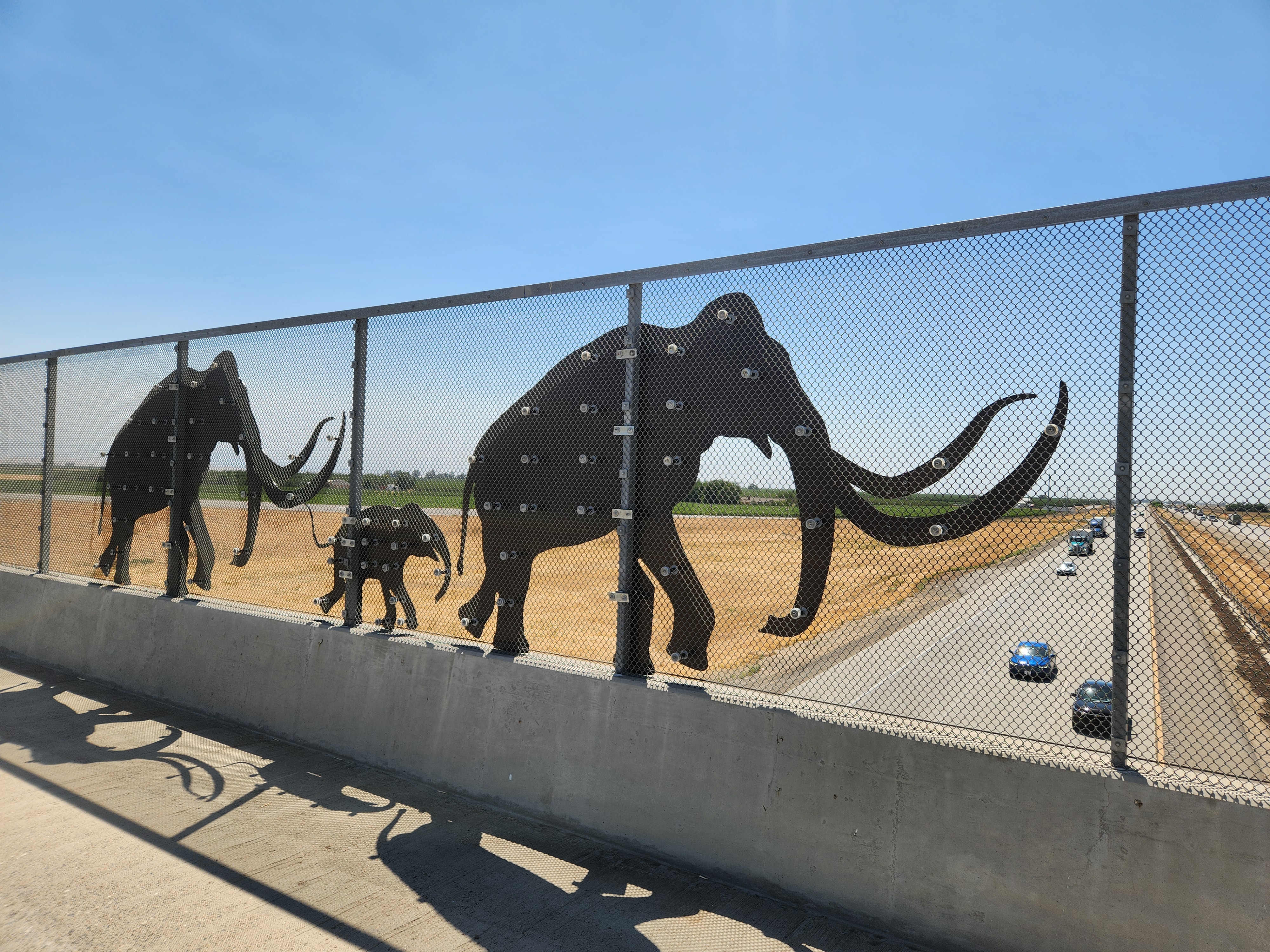 Image of the Mammoth Silhouettes  on the SR99 over pass in Merced
