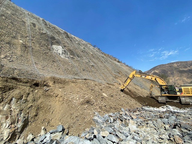 Excavator Rock Face Drapery