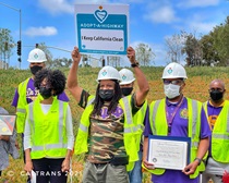 Omega Psi Phi Fraternity Phi Omicron Chapter holding Sign. For more information, call (619) 688-6670 or email CT.Public.Information.D11@dot.ca.gov