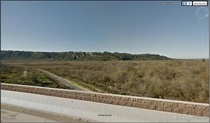 Figure SD-02B — Southbound View of Los Penasquitos/Natural Landforms of Torrey Pines State Preserve. For more information call (619) 688-6670 or email CT.Public.Information.D11@dot.ca.gov