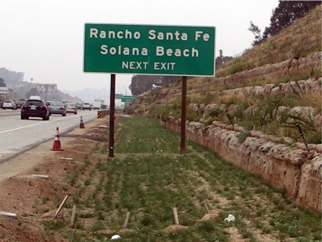 I-5 @ Lomas Santa Fe Biofiltration Swales after construction (Solana Beach sign). For more information call (619) 688-6670 or email CT.Public.Information.D11@dot.ca.gov